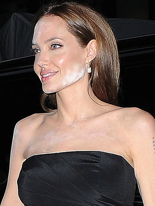 Angelina-Jolie-suffers-white-powder-disaster-arrives-Brad-Pitt-The-Normal-Heart-premiere-NYC