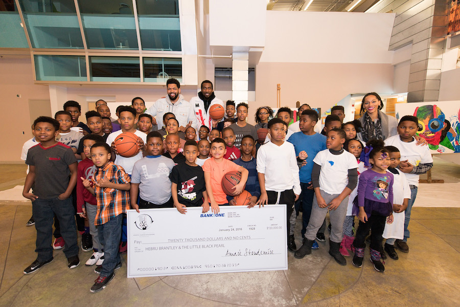 CHICAGO, ILLINOIS - JANUARY 24:  Hebru Brantley, Amar'e Stoudemire and Alexis Stoudemire attend Amar'e Stoudemire and Melech Collection present 'In The Paint' Series #2 with Hebru Brantley at Little Black Pearl School on January 24, 2016 in Chicago, Illinois.  (Photo by Daniel Boczarski/Getty Images for Amar'e Stoudemire)